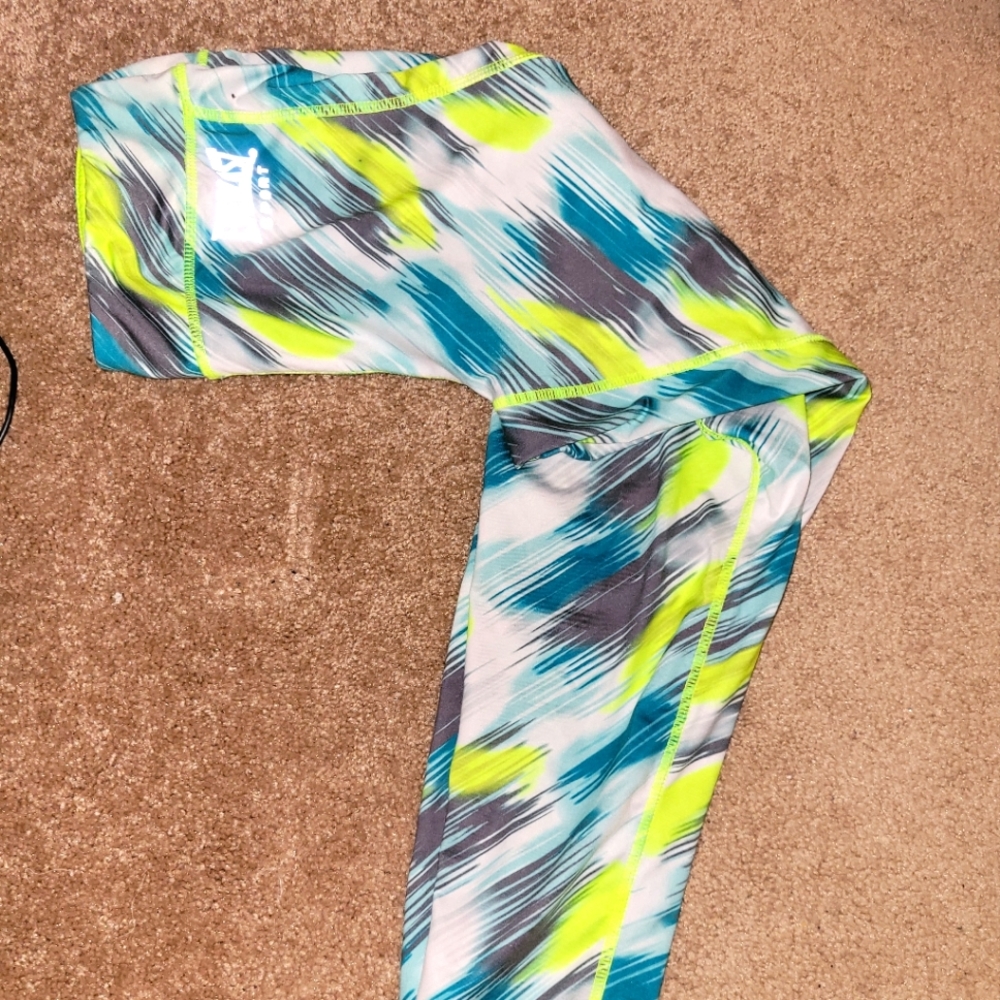 Blue, green, gray, and white leggings, size 14/16